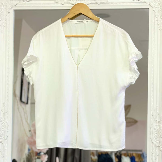 Haut blanc liseré doré