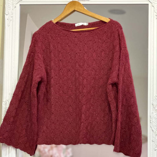 Pull bordeau avec paillettes