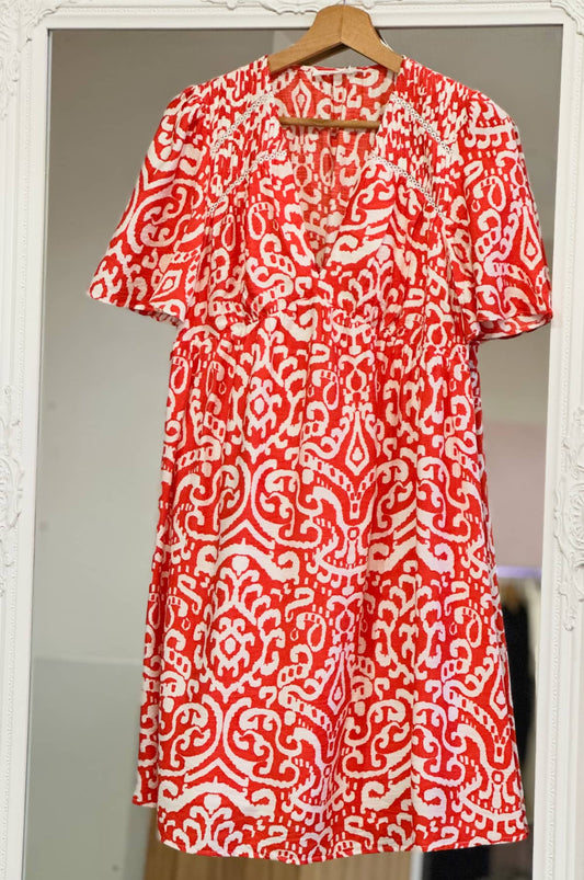 Robe courte imprimé orange et ivoire